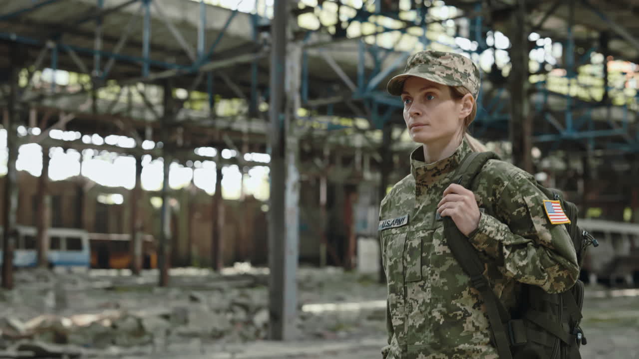 Woman Soldier in a Ruined Building