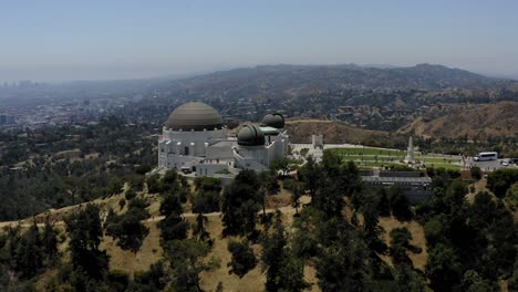 aerial video slowly orbiting the griffith observatory