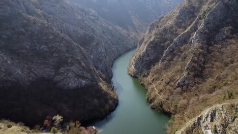 drone footage pulling back to reveal the stunning scenery of matka canyon, macedonia