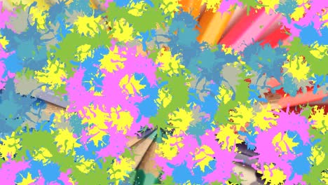 animation of colorful blots over crayons