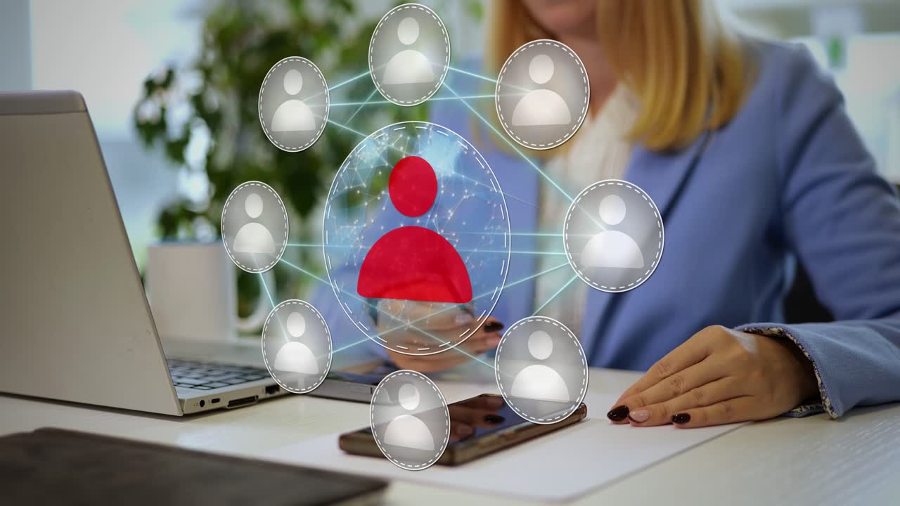 A Lady Works on Her Laptop as a Digital Network Overlay Symbolizes Her Leadership and Connection With Her Team - Close Up