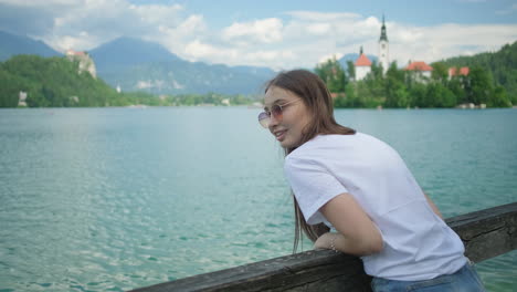 woman enjoying lakeside view