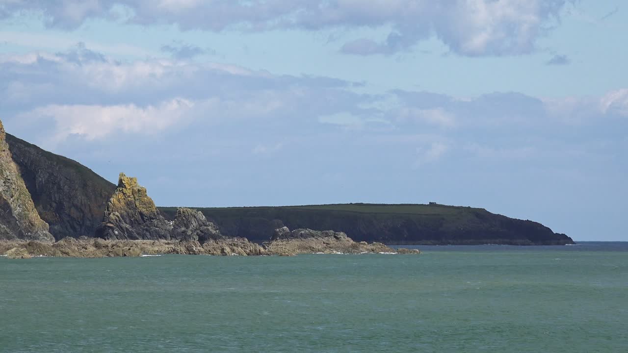 Coastal Landscape with Rocky Cliffs and Sea