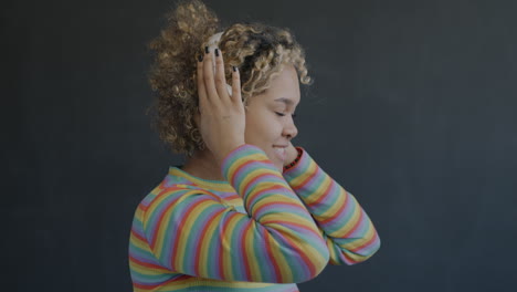 young woman listening to music