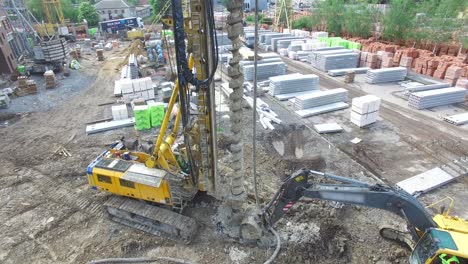 aerial shot of the drilling rig boring hole in soil at construction site