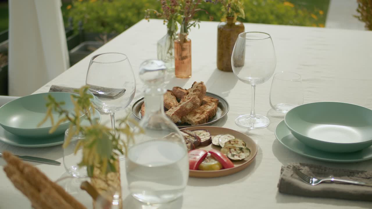 Shot Of Table Set With Grilled Vegetables And Bread