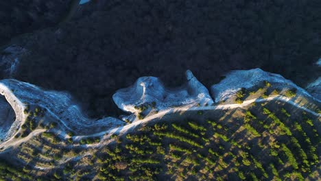 aerial view of unique rock formations and forest