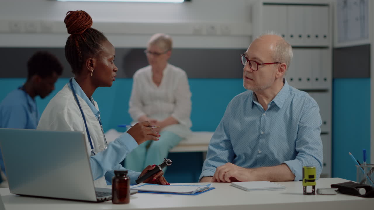 Medical consultation with doctor and patient