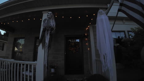 front of a house decorated for halloween