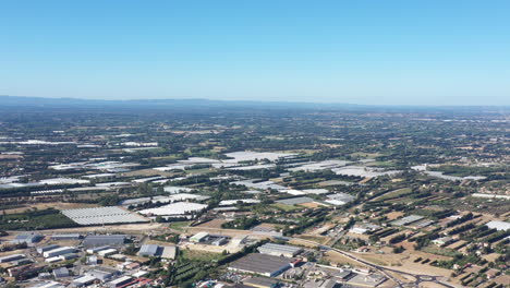 agricultural and industrial aerial landscape france sunny day fields orchard