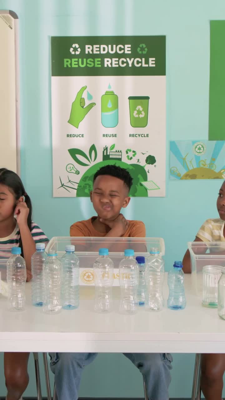 Vertical video: Right kid raising hand urging rust tee boy turning, moving near bottles at table