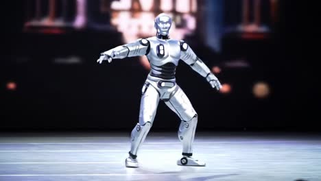 a futuristic robot dancer showcasing advanced movement and grace on stage with stunning visuals and a captivating performance in modern robotics
