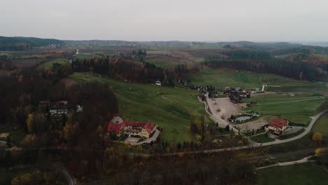 Aerial-view-of-grey-cloudy-autumnal-day-in-Kashubian-Lake-Pomeranian-Voivodeship-Poland