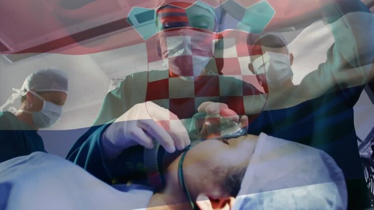 Animation of flag of croatia waving over surgeons in operating theatre