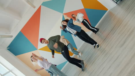 group dance performance in a colorful studio