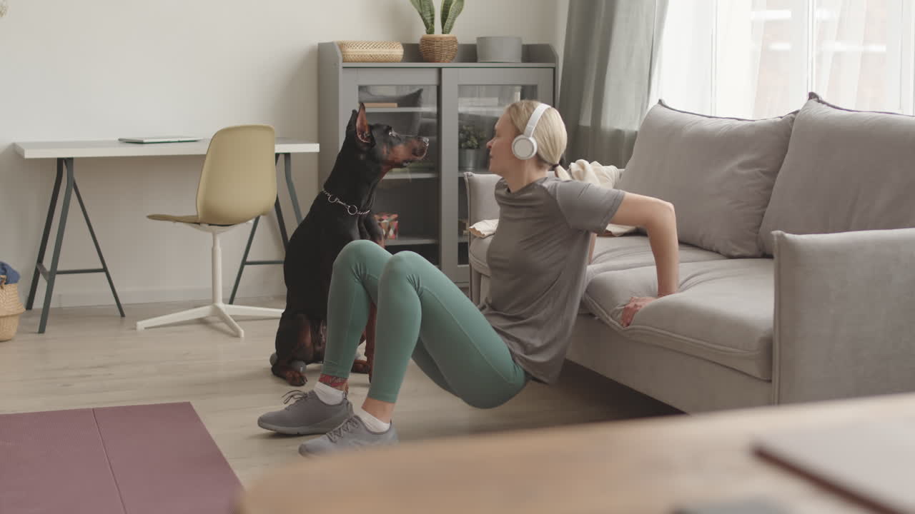 Dog Watching Woman Doing Bench Dips