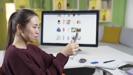 small business owner woman counting money earned in home office concept.