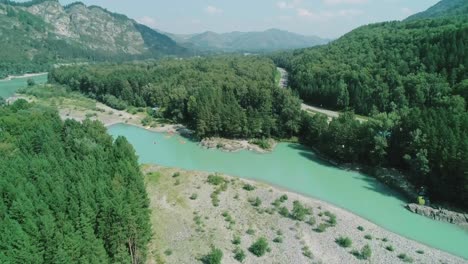 aerial over beautiful turquoise river katun in republic of altai, russia. beautiful summer lanscape