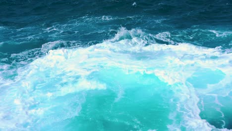 breaking waves at playa mar chiquita in puerto rico. tracking shot