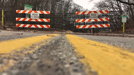 signs and fence marking the road closure at beach street