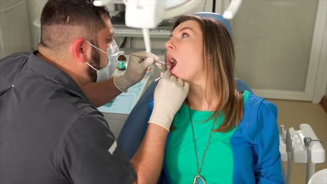 dentist examining patient