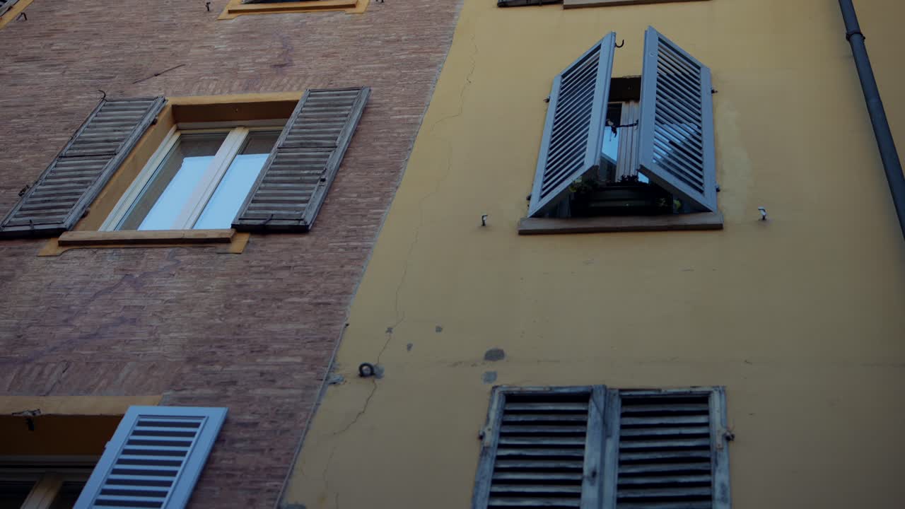 Vintage European Building Facade with Shutters