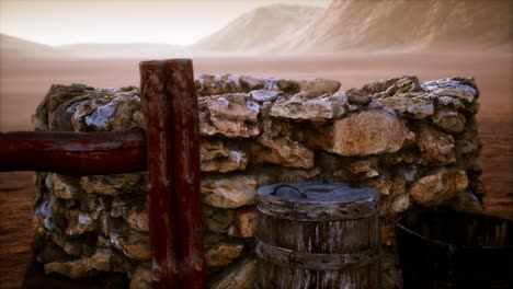 old stone water well in the desert