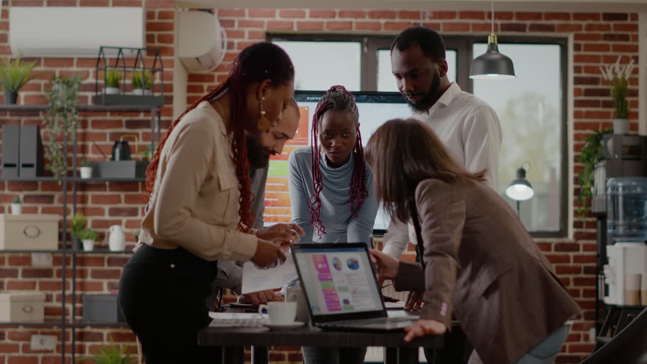 Multi ethnic colleagues working together on business strategy