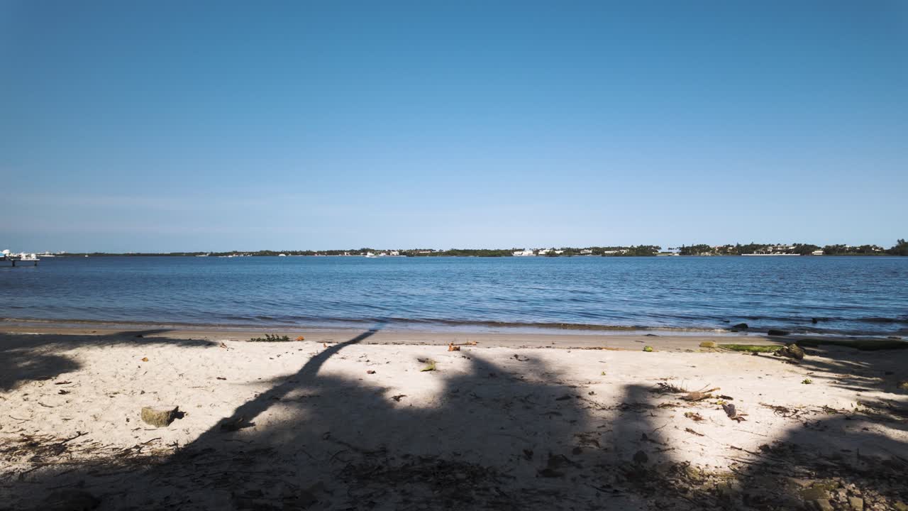 Slow right to left pan showing the Intracoastal Waterway at Summa Beach Park in West Palm Beach Florida
