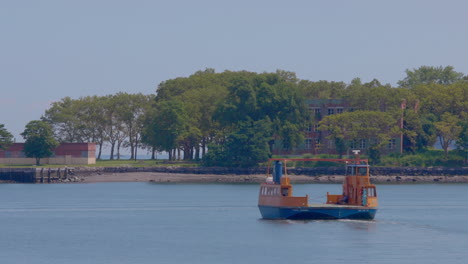 Roll-on,-roll-off-orange-ferry-heading-to-Hart-Island