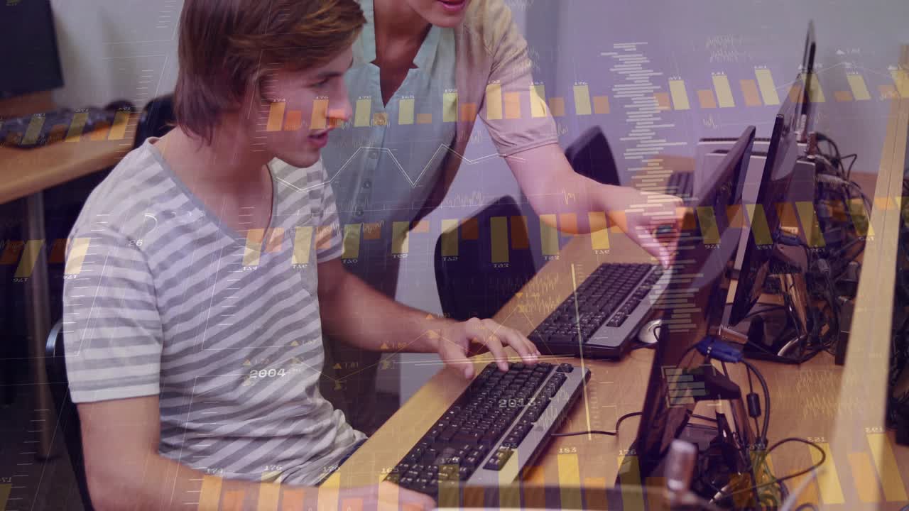 Instructor leaning over student, pointing at screen, guiding typing for class with animated charts