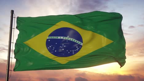 flag of brazil waving in the wind against deep beautiful sky at sunset