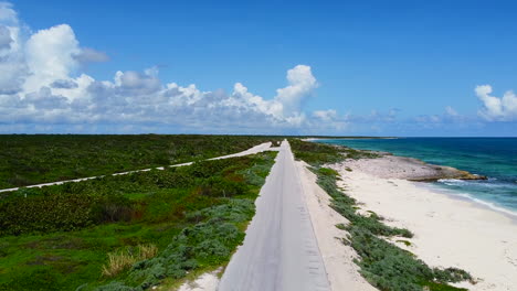 aerial landscape of long coastline road in cozumel mexico on sunny summer day