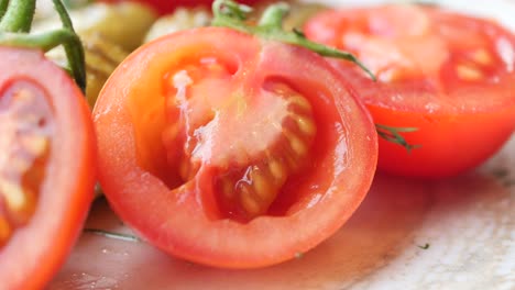 fresh, red tomatoes with green stems