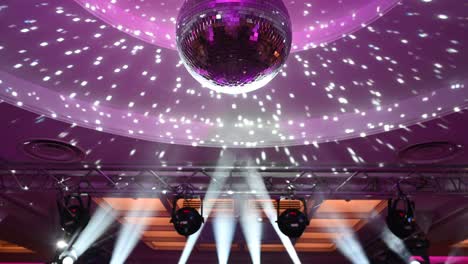 disco ball, view from below, from the disco ball beams, stage light, mirror ball