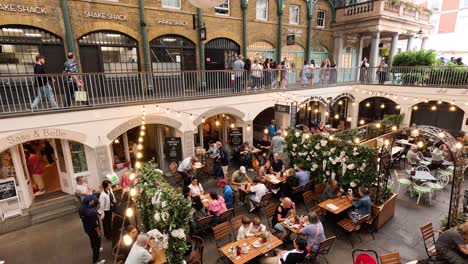 people enjoying meals at a bustling restaurant