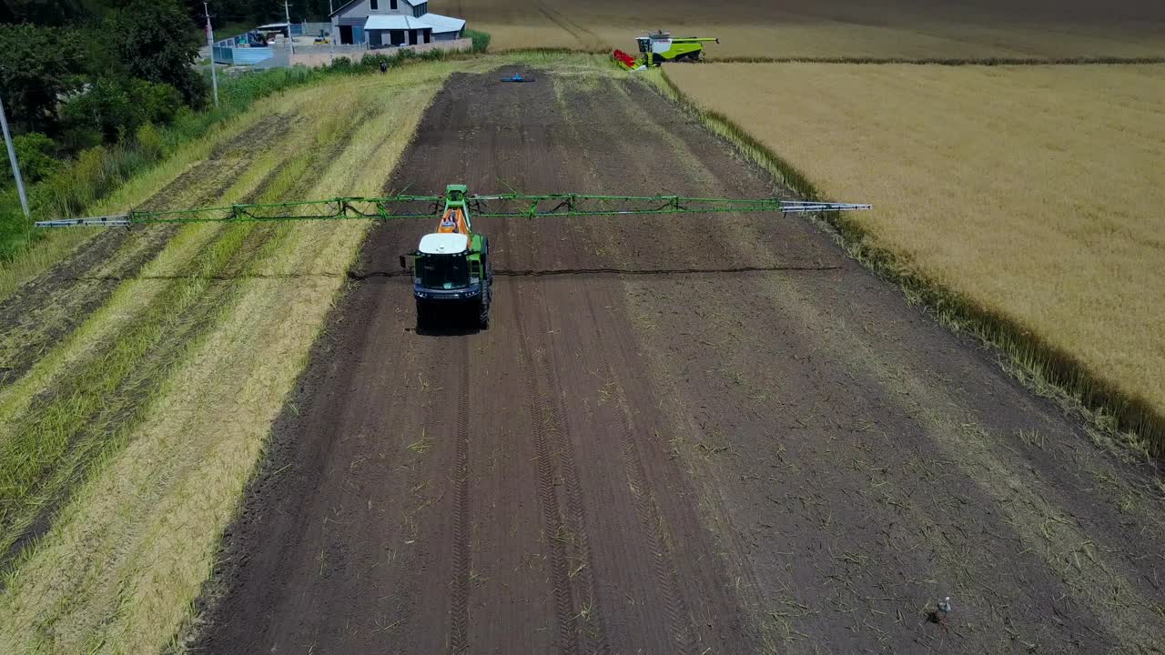 Self-Propelled Sprayer On Farm. VINNITSA, UKRAINE - JULY 2017: Self-propelled sprayer irrigating crops on agriculture farm