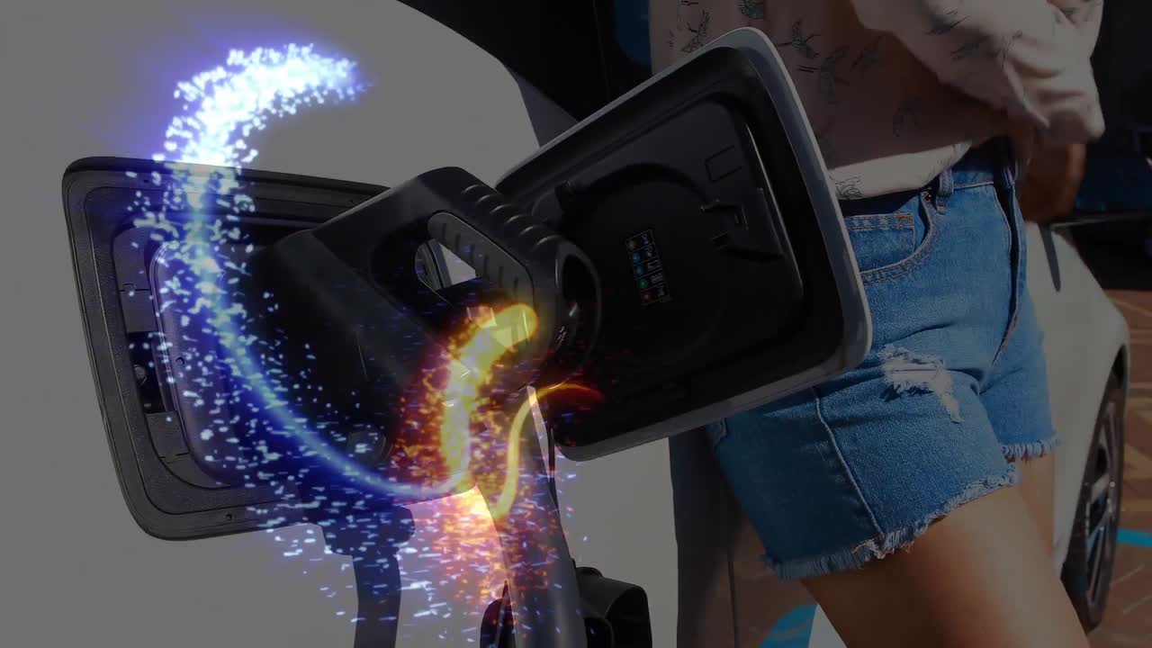 네트워크의 반 ⁇ 이는 선으로 전기 자동차를 충전하는 여성