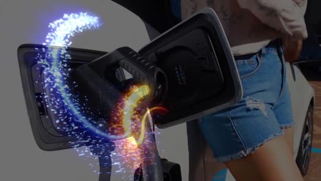 mujer cargando un coche eléctrico con líneas brillantes de red
