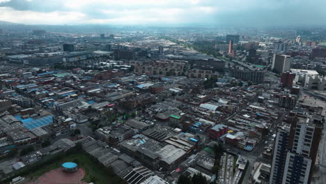 aerial view over samper mendoza toward puente aranda in cloudy bogota, colombia