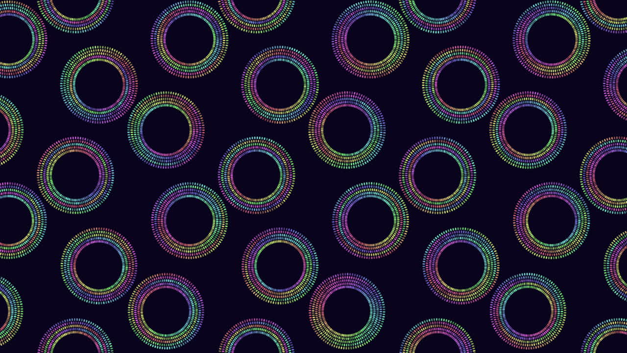 Vibrant and dynamic, the image showcases a spiral pattern of colorful circles on a black background. Shades of color merge, creating an eye-catching and captivating visual spectacle