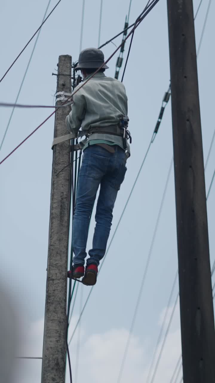 Lineman Working on Utility Pole