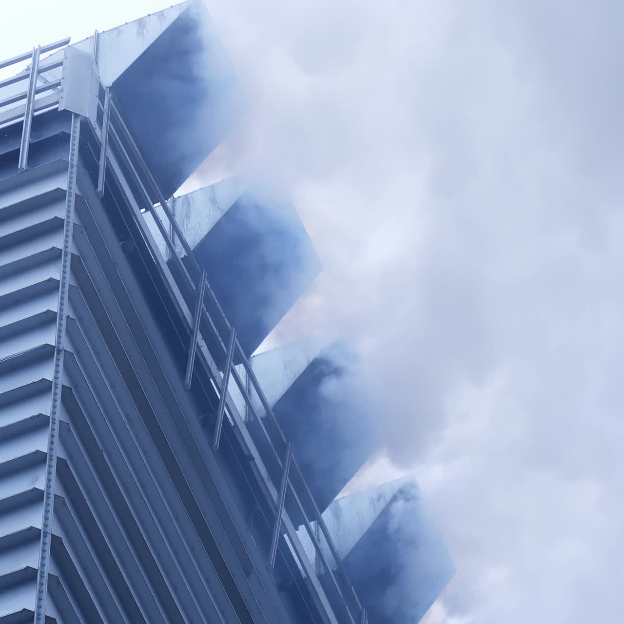 Grain processing works. Smoke comes out of the chimneys of the plant