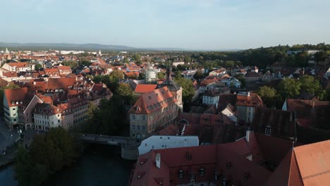 drone shot of old townhall in bamberg during sunny day moving sidewards