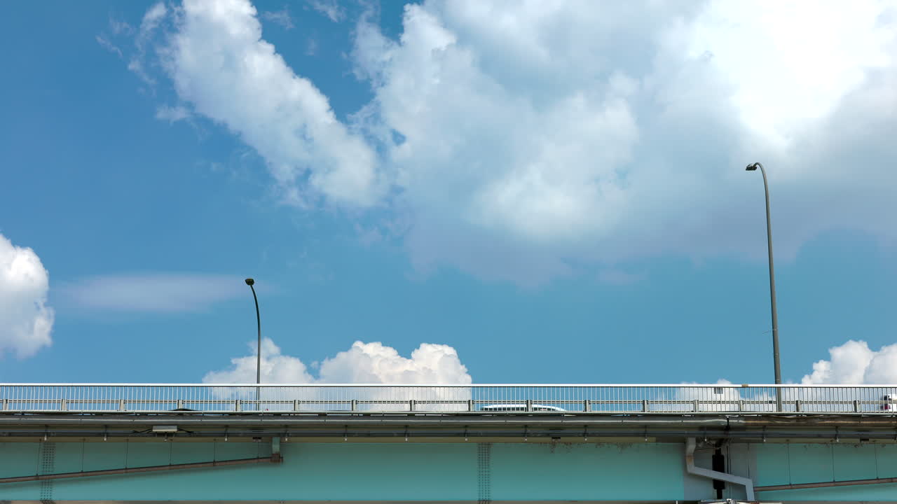 Fast moving clouds over the bridge