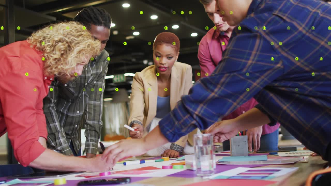 Curly-haired woman arranging sheet initiating team designing prototype with animated color swatches