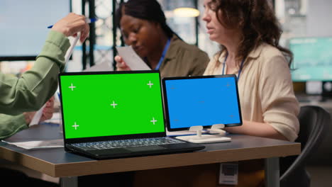 empowered group of women managers utilizes a chroma key screen