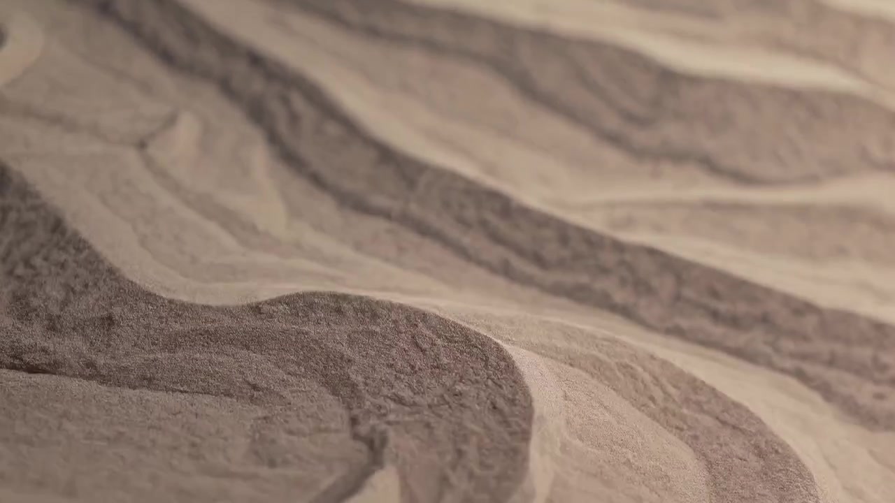 Primer plano de un patrón ondulado abstracto con textura arenosa
