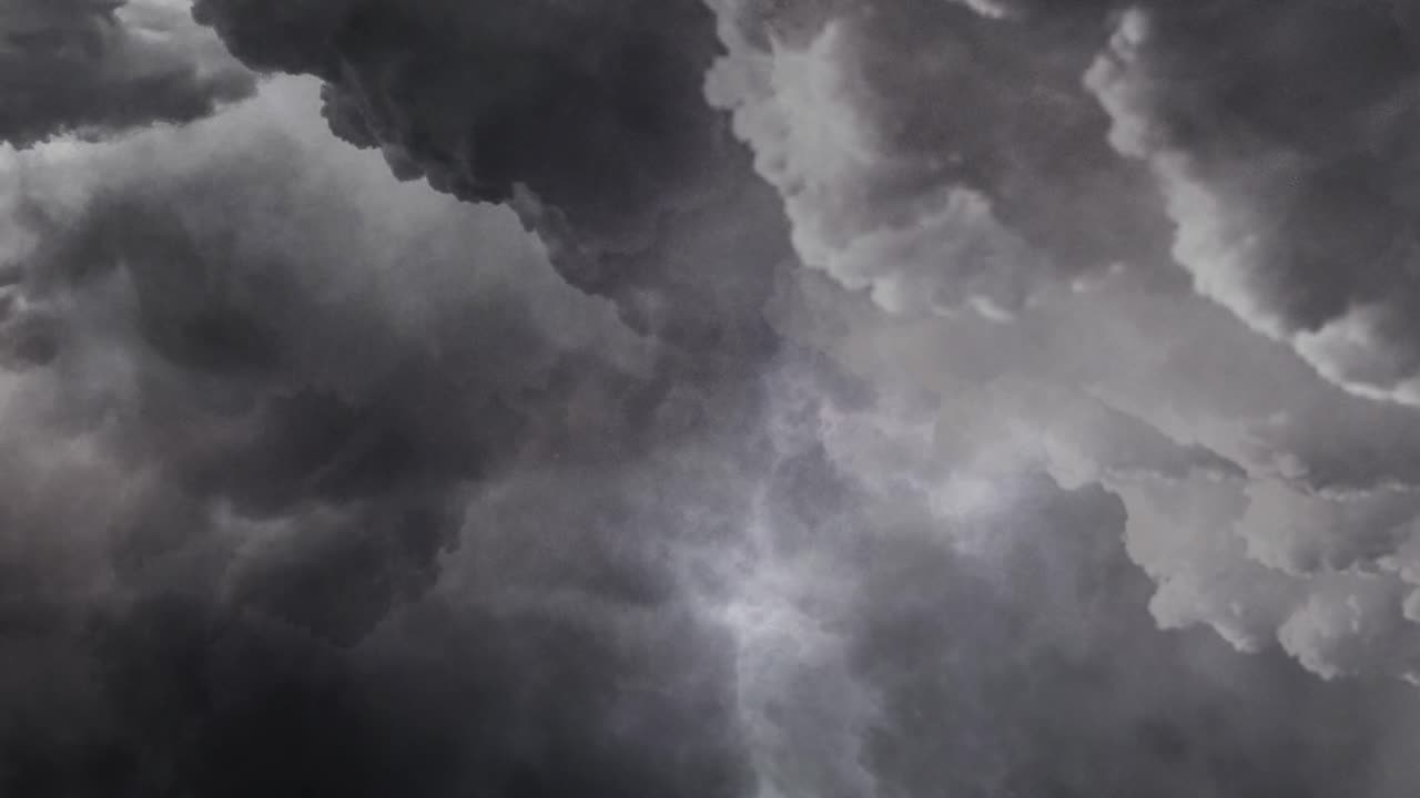 a thunderstorm inside a gray dark  cumulus cloud