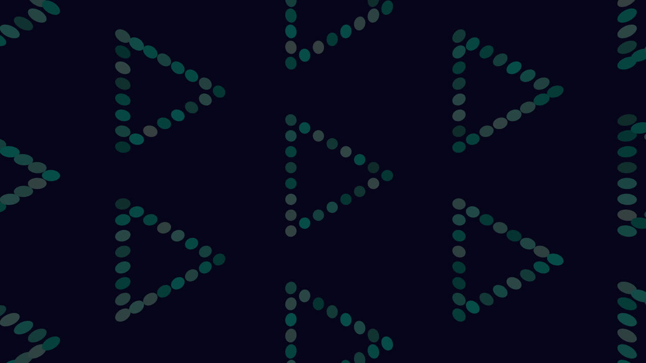 los puntos de verde crean un patrón de triángulo simétrico en un fondo oscuro